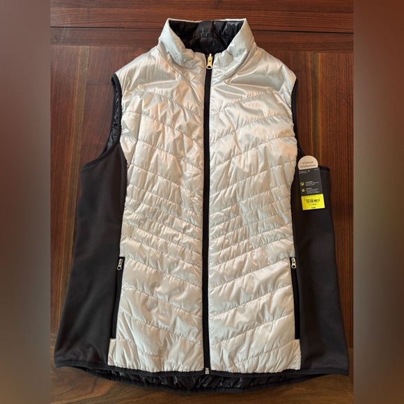 Xersion Jackets & Blazers - Xersion reversible stretch full zip vest. Black and silver. NWT. XL